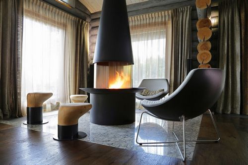 Дизайн гостиной с камином: подборка фото красивых интерьеров