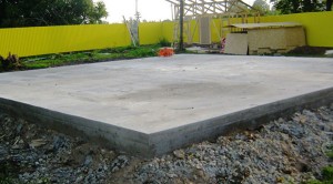Строительство надежного фундамента на основе монолитной плиты из бетона