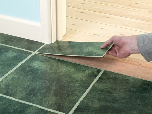 Укладка плитки на старую плитку на полу в ванной и подготовка поверхности